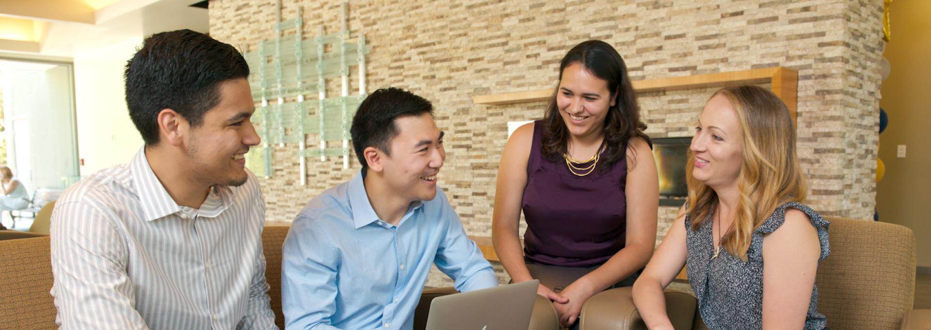 Full-Time MBA students in Gallagher Hall lobby