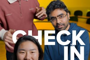 Three people facing the camera in a meeting room with "MID-YEAR CHECK IN" written in large white letters over the image.