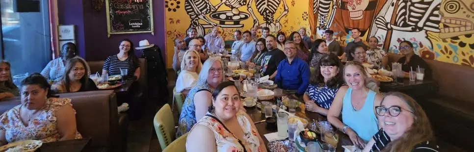 Leadership Academy 2024 participants out at dinner at a restaurant