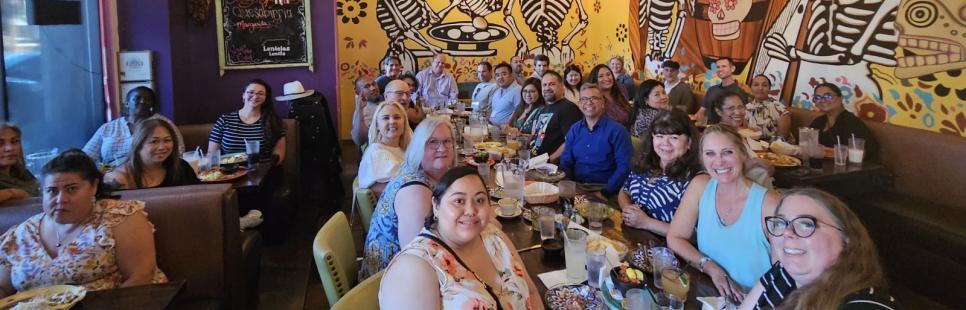 Leadership Academy 2024 participants out at dinner at a restaurant