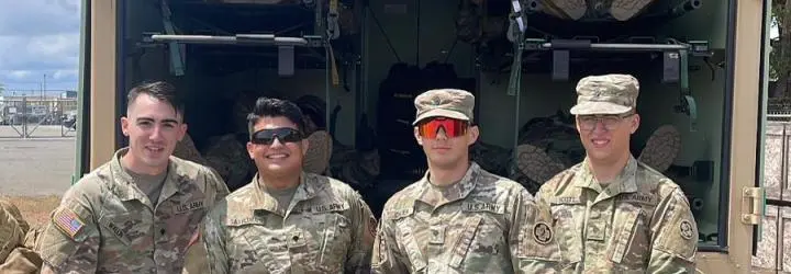 Eduardo Saavedra and three fellow soldiers
