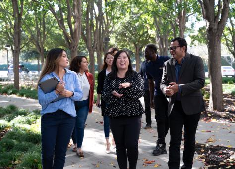 Bay Area MBA students take a break from class on the patio outside Bishop Ranch.