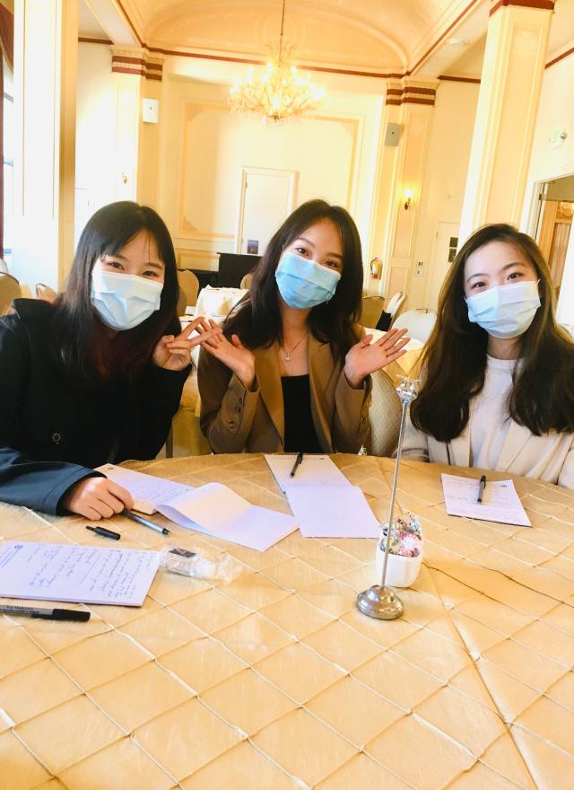 Three women sitting at. a table