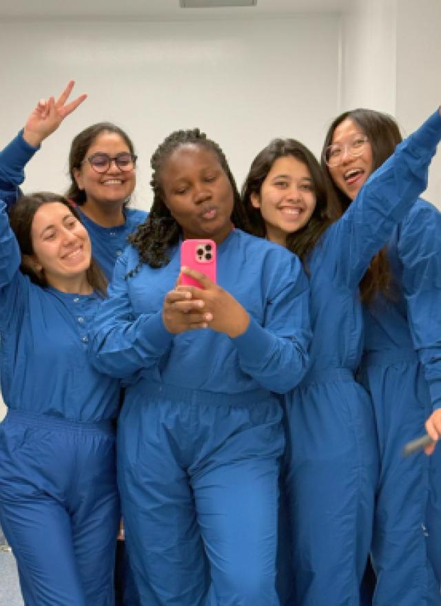 Temidire Dada and MBA students posing for a selfie
