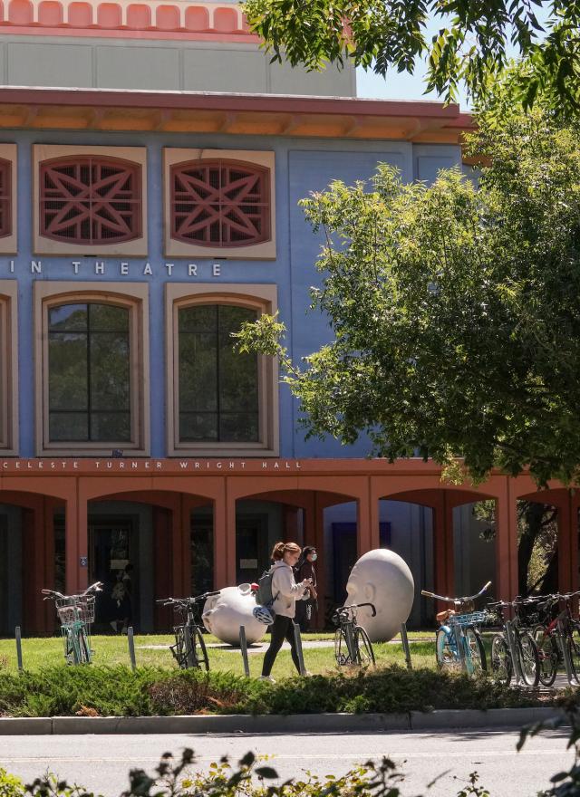 Student walking on UC Davis campus