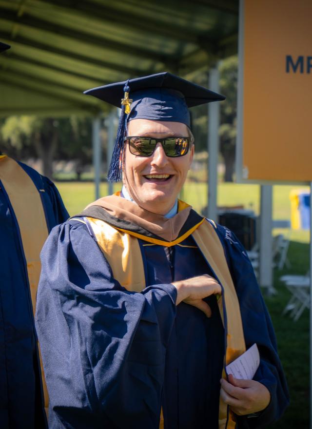 Tim O'Brien in graduation regalia