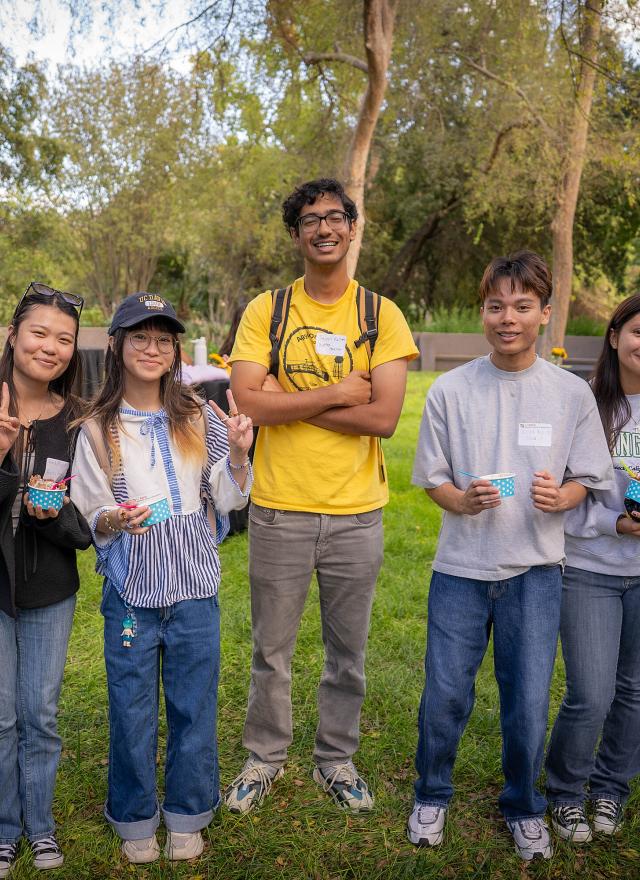 Business major students at an event on campus