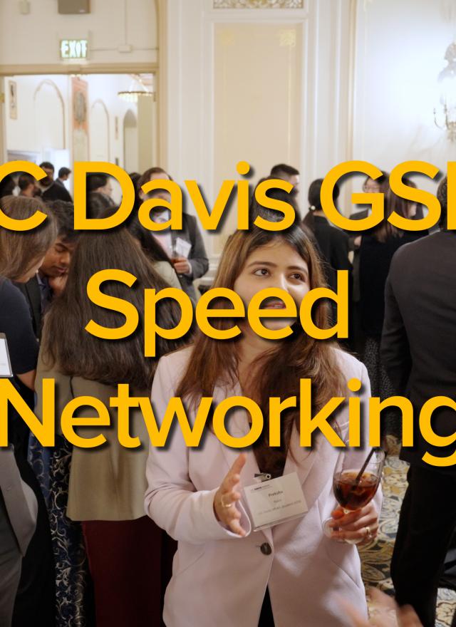 three students talking to each other 