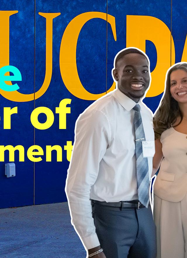 Three MM Students in front of a UC Davis sign