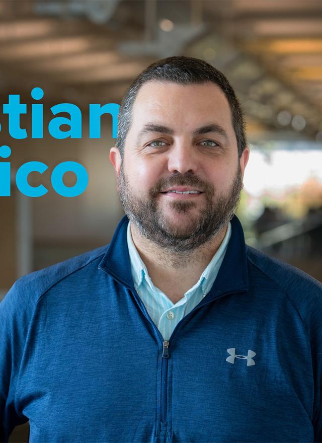 A man in a blue jacket stands indoors; text next to him reads "Sebastian Calonico We Are GSM.