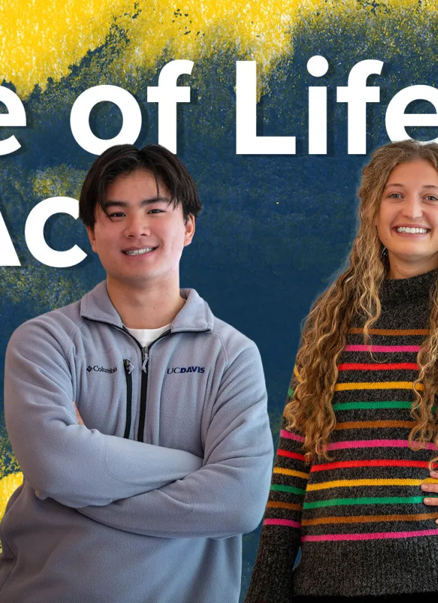 Three young adults stand smiling in front of a yellow and blue painted background with the text “Slice of Life MPAcc” displayed above them.