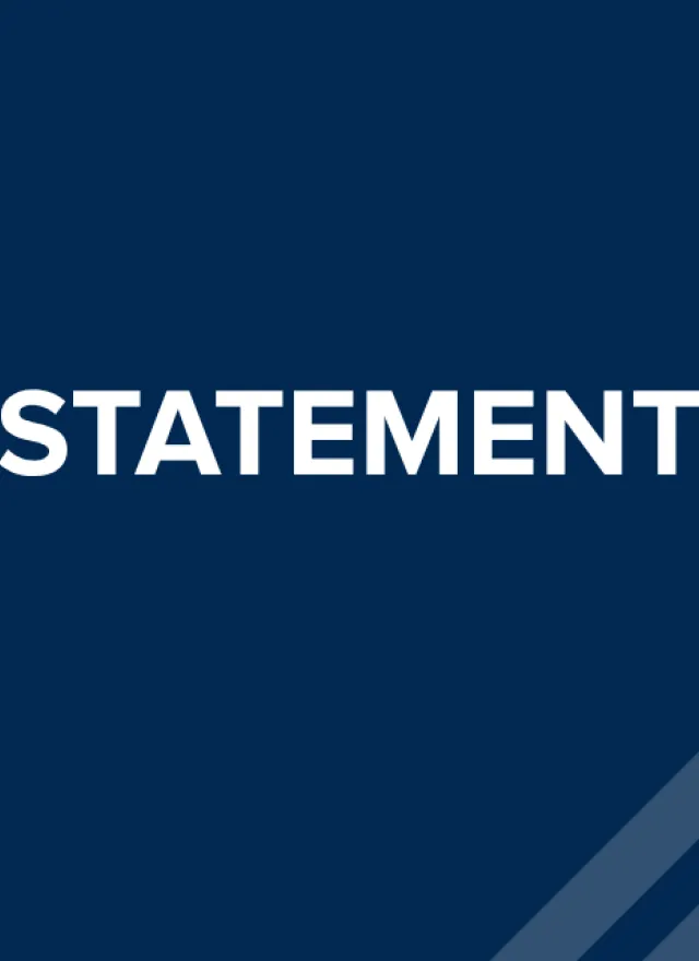 White text reading “STATEMENT” is centered on a solid dark blue background with three diagonal light blue lines in the lower right corner.