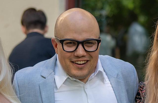 Caleb Cavazos and two other alumni at the 2025 reunion