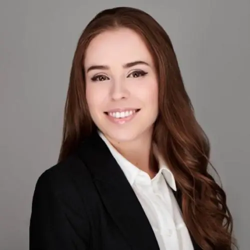 Woman smiling in professional attire