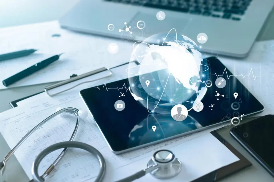 tablet with healthcare symbols