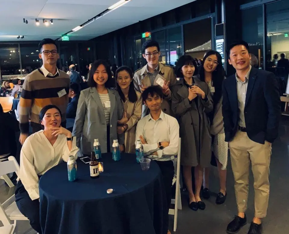 Maxine Li and Michael Chen join other MSBA students at a mixer