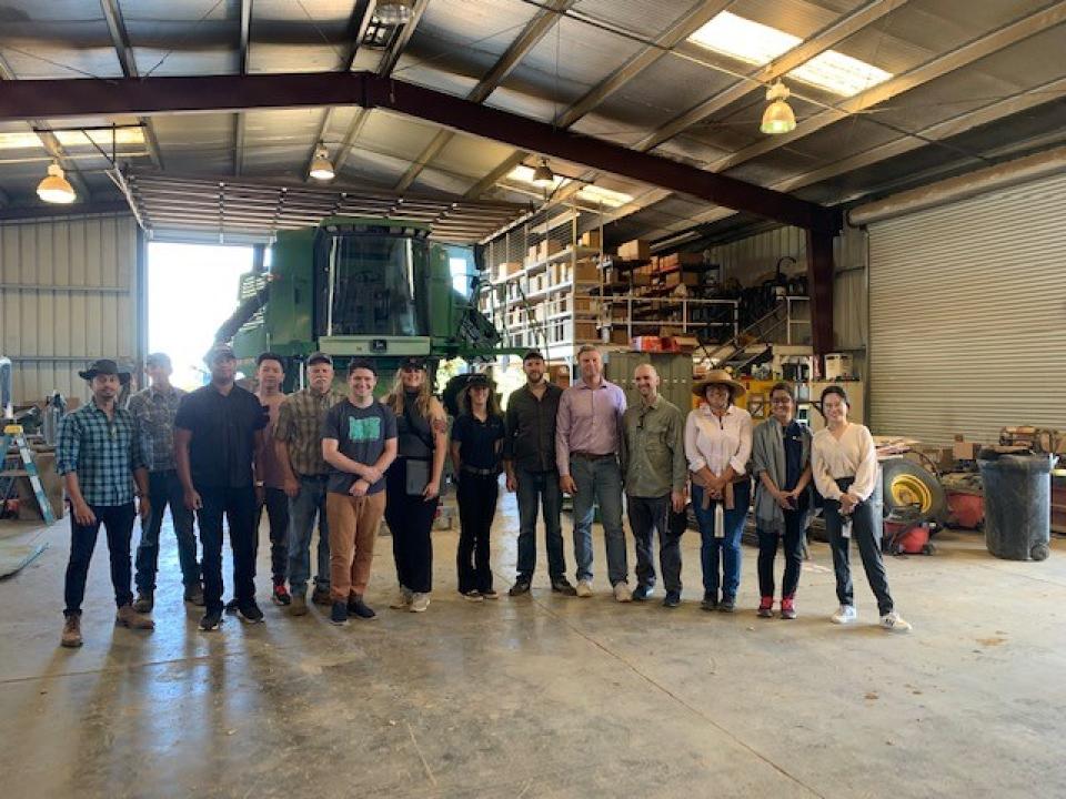 Group of people inside of a winery