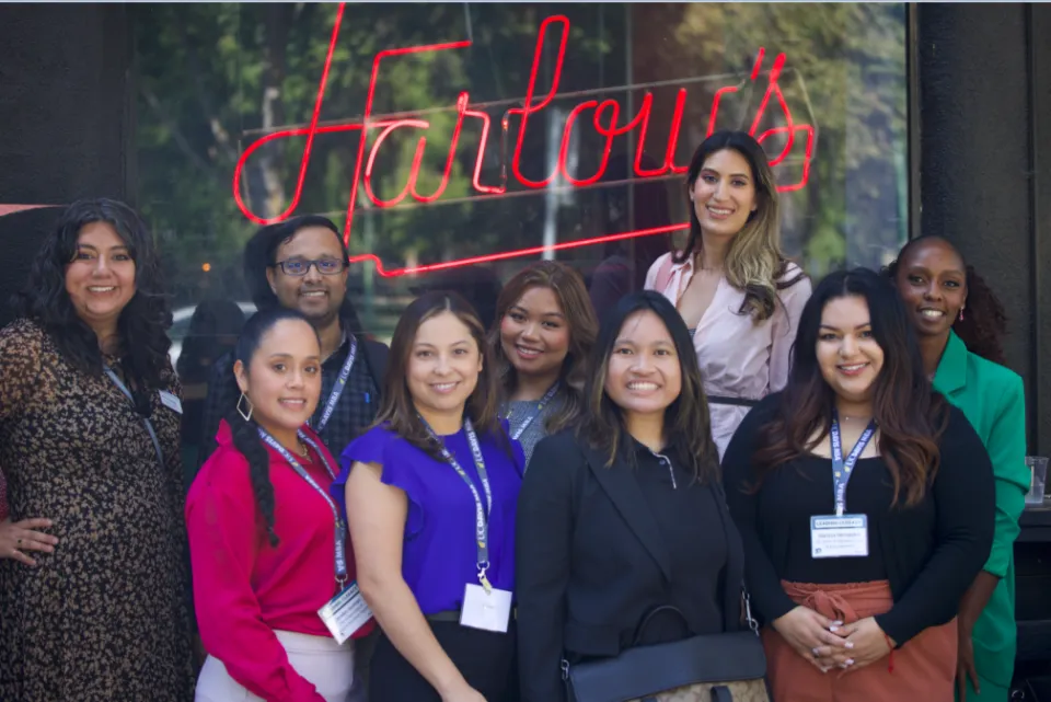 A group of Sac MBA students outside a restaurant in midtown Sacramento