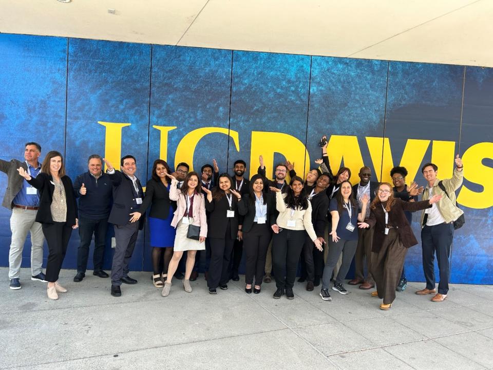 Judges and students outside the Welcome Center