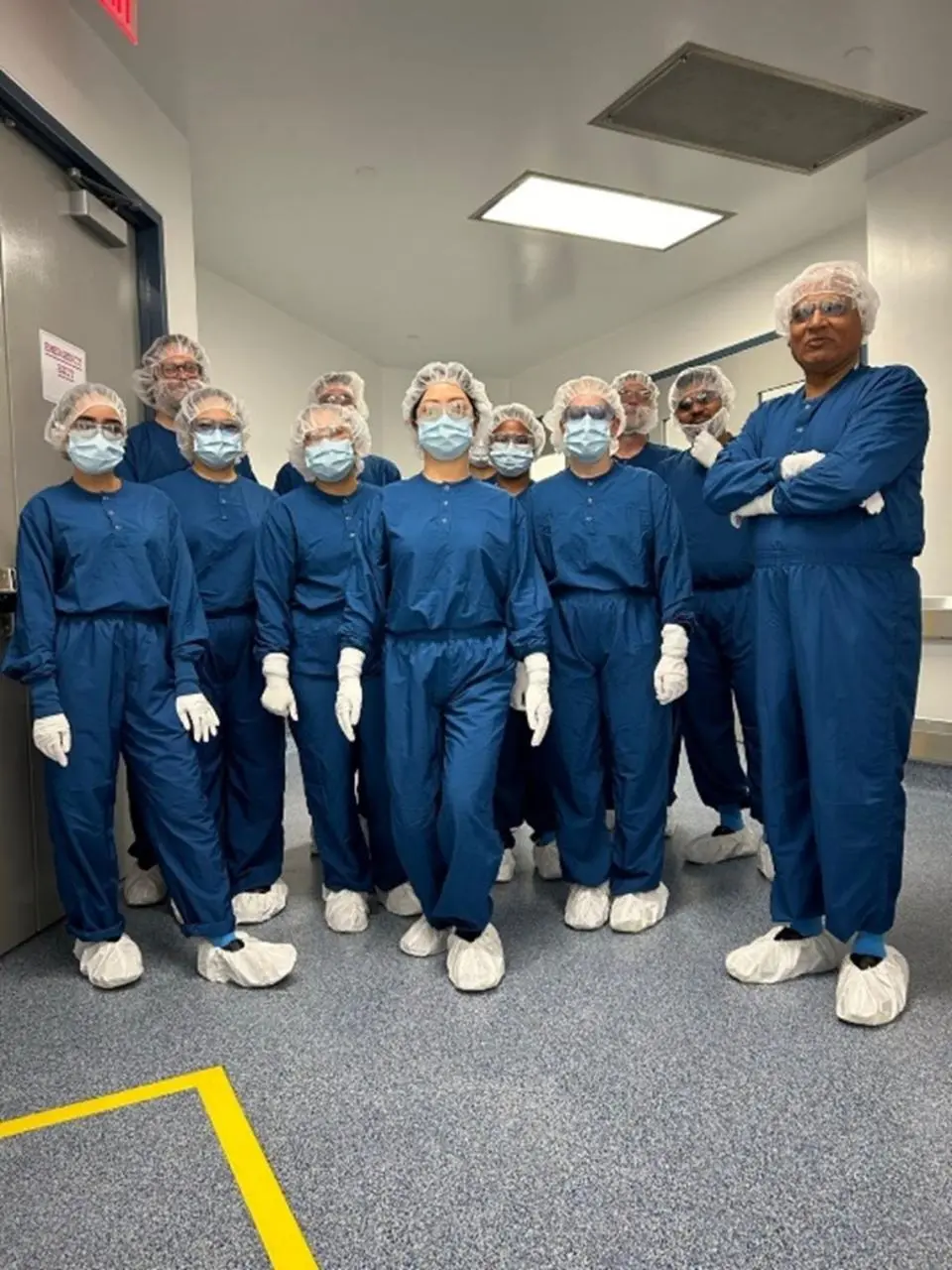 Students dressed in personal protective equipment