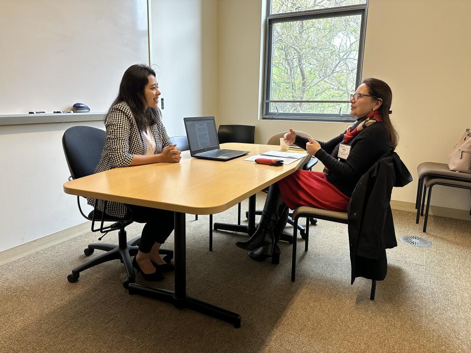 Sraboni Saha and Sunita Dhar in a study room at Gallagher Hall