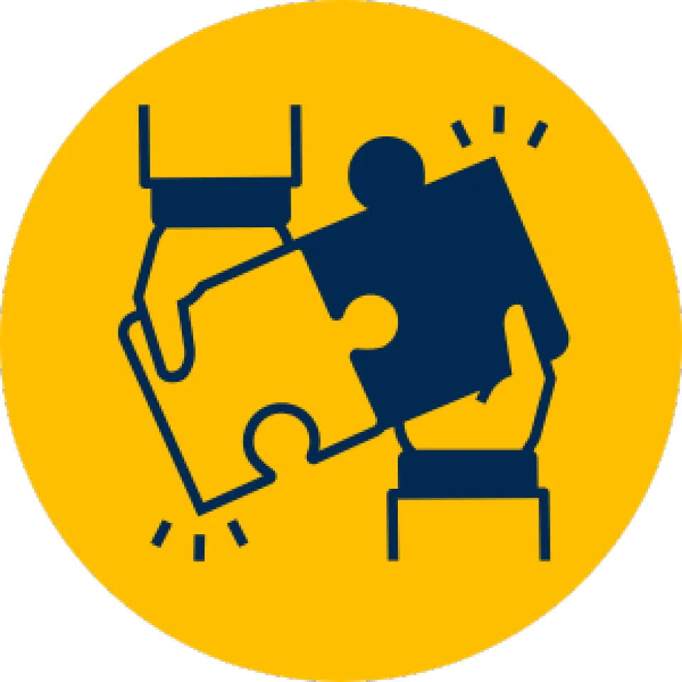 Icon of hands holding puzzle pieces
