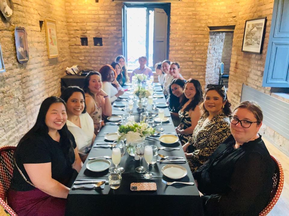 MBA students in Chile, seated at a dining table