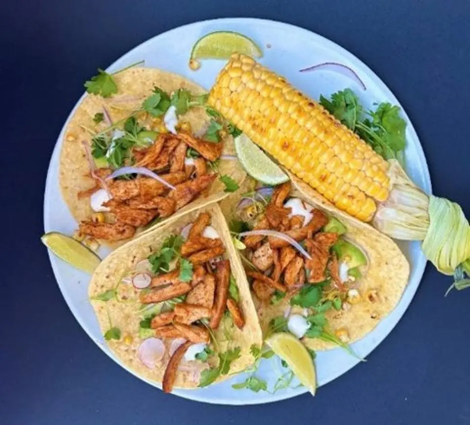a plate of tacos served with Yeti Food meat alternative 