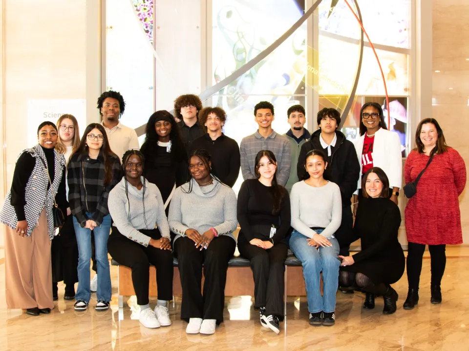 Shaneil McKenzie with a group of student mentees