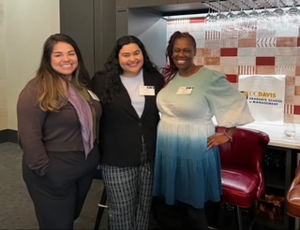 Krystal Scruggs standing with two other women