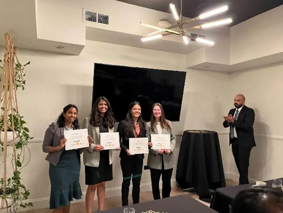MSBA students holding up certificates