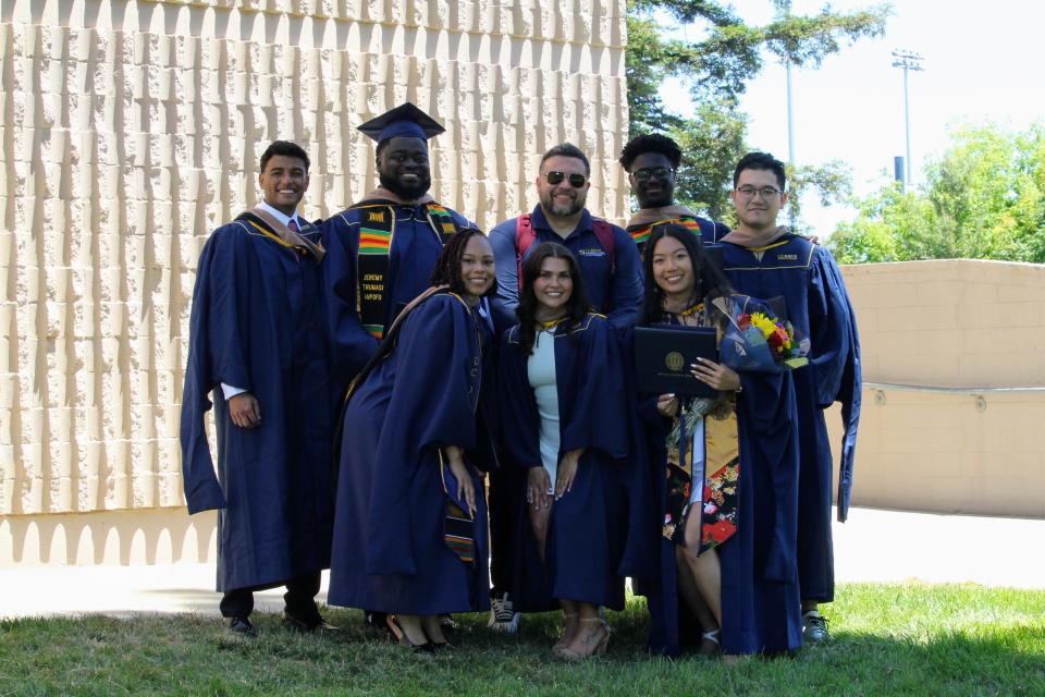MSBA graduates with Eric Duarte-McDermott