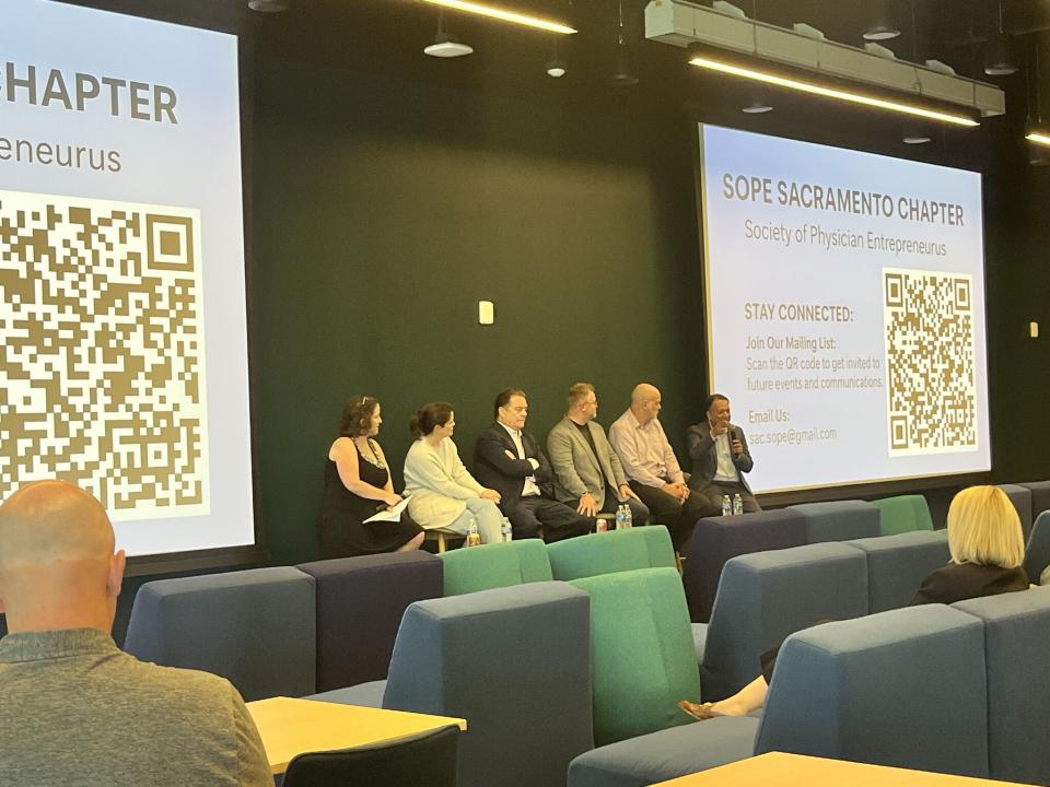 Panelist in a conference room