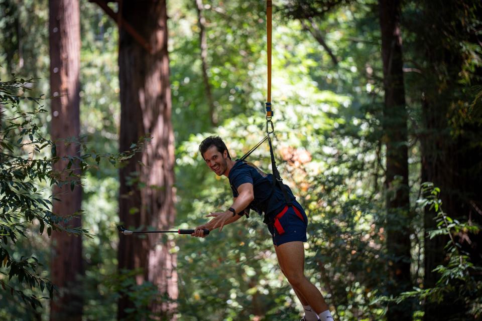Daniel Vaziri hanging from a harness