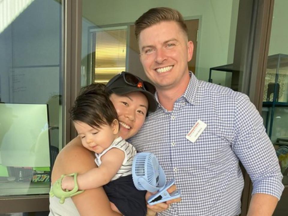 Jason Bartus with wife and son