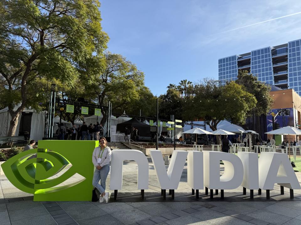 Prachi Misha standing in front of NVIDIA signage 