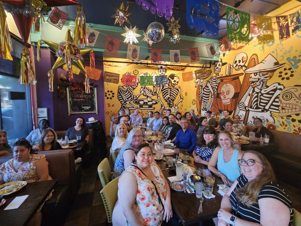 Leadership Academy 2024 participants out at dinner at a restaurant