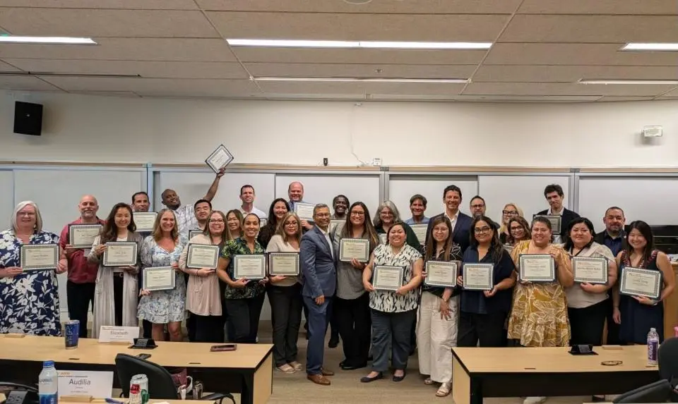 Leadership Academy 2024 participants in a group photo with their certificates
