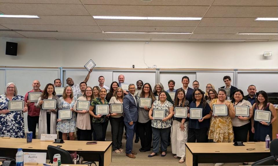 Leadership Academy 2024 participants in a group photo with their certificates