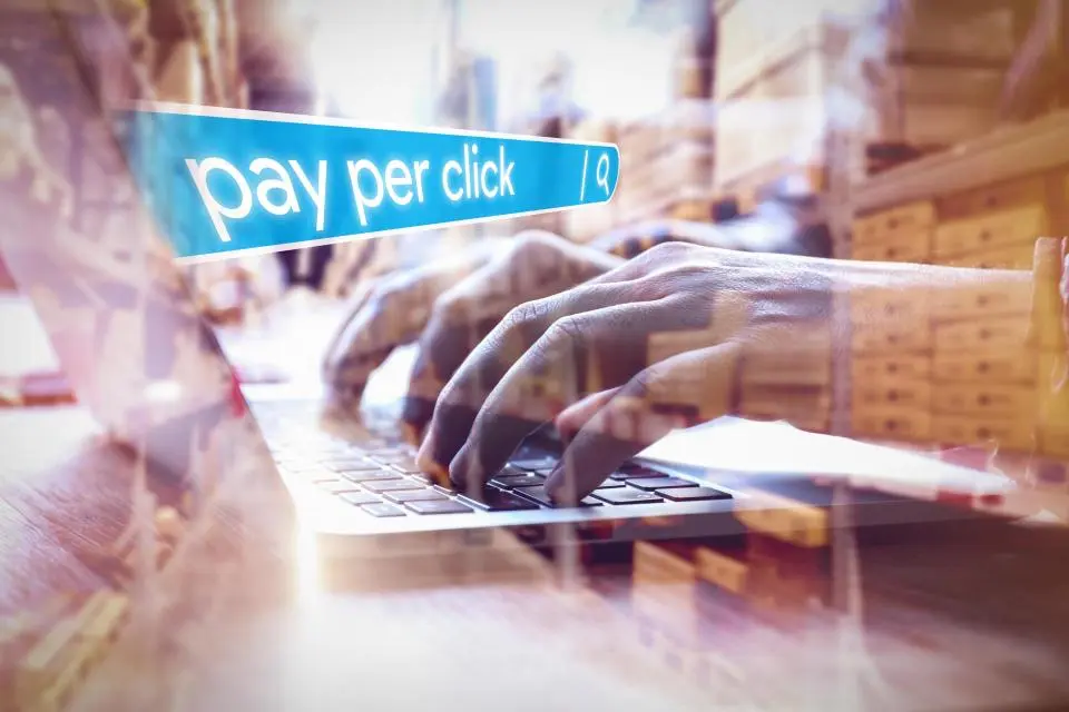 A person typing on a keyboard
