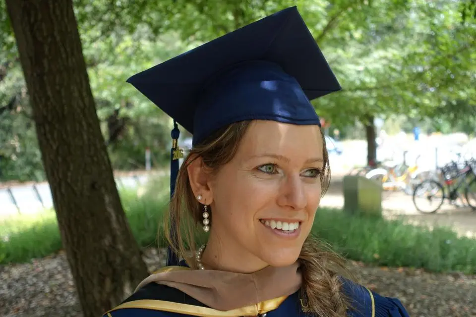 Daniella Smith wearing commencement regalia