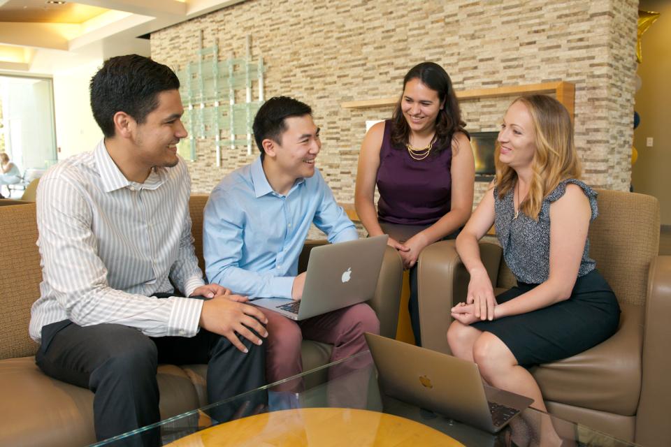 Full-Time MBA students in Gallagher Hall lobby