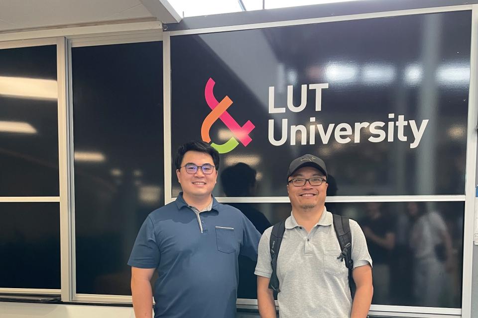 People in front of LUT University sign