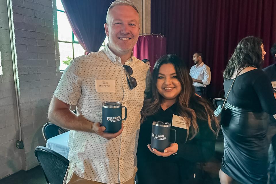 Marissa Hernandez and Chris Marshall, director of alumni relations and network strategy at the Metro EDGE event