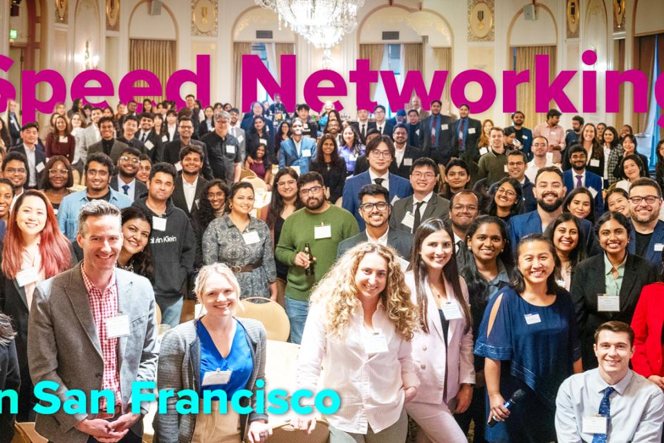 a group shot of all attendees at the GSM speed networking event in a hotel lobby