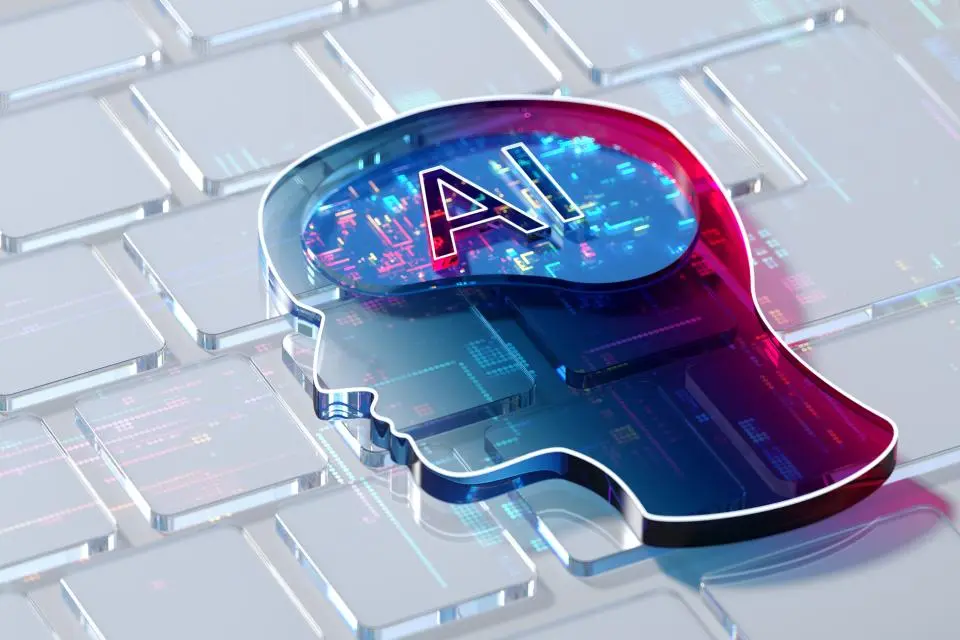 Image of AI emblazoned on brain overlaying keyboard