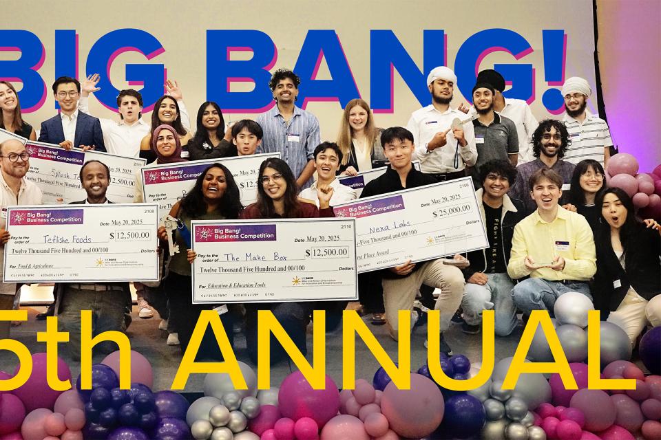 winners on stage with checks