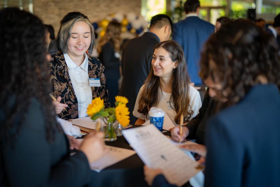 Students in the Gallagher Hall lobby at orientation