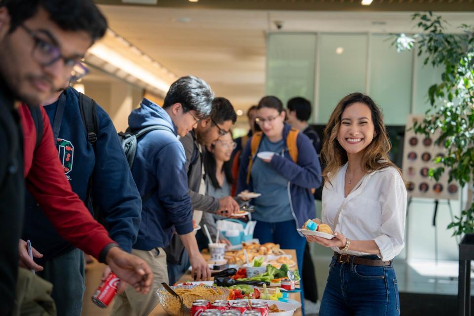 Students getting food and snacks at GSM connections
