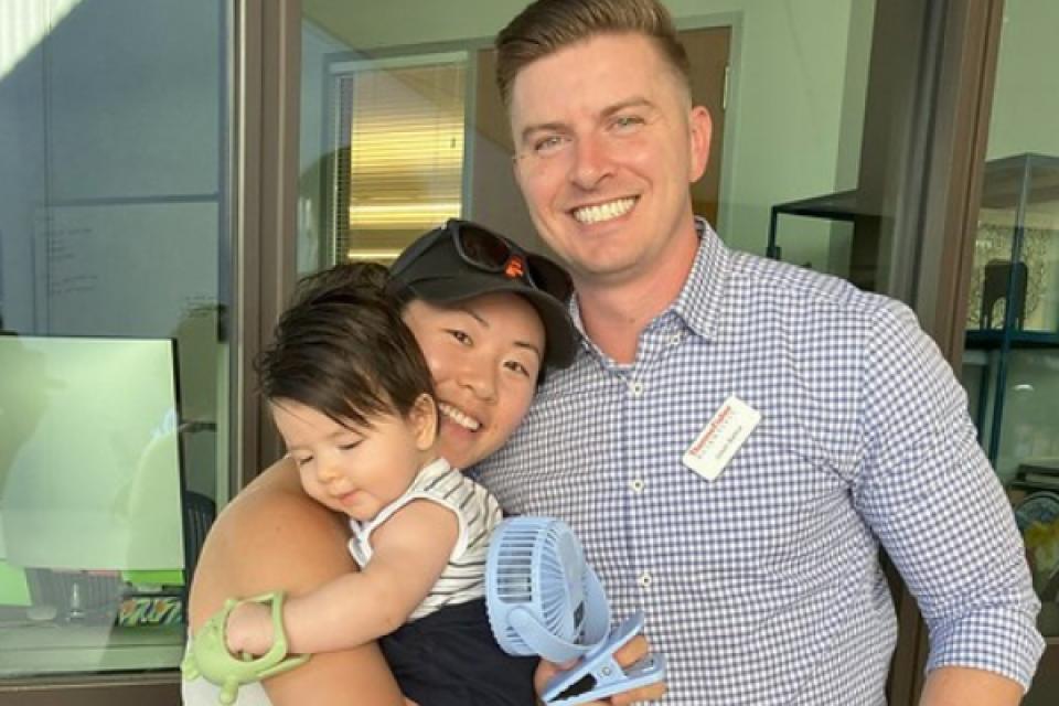 Jason Bartus with wife and son